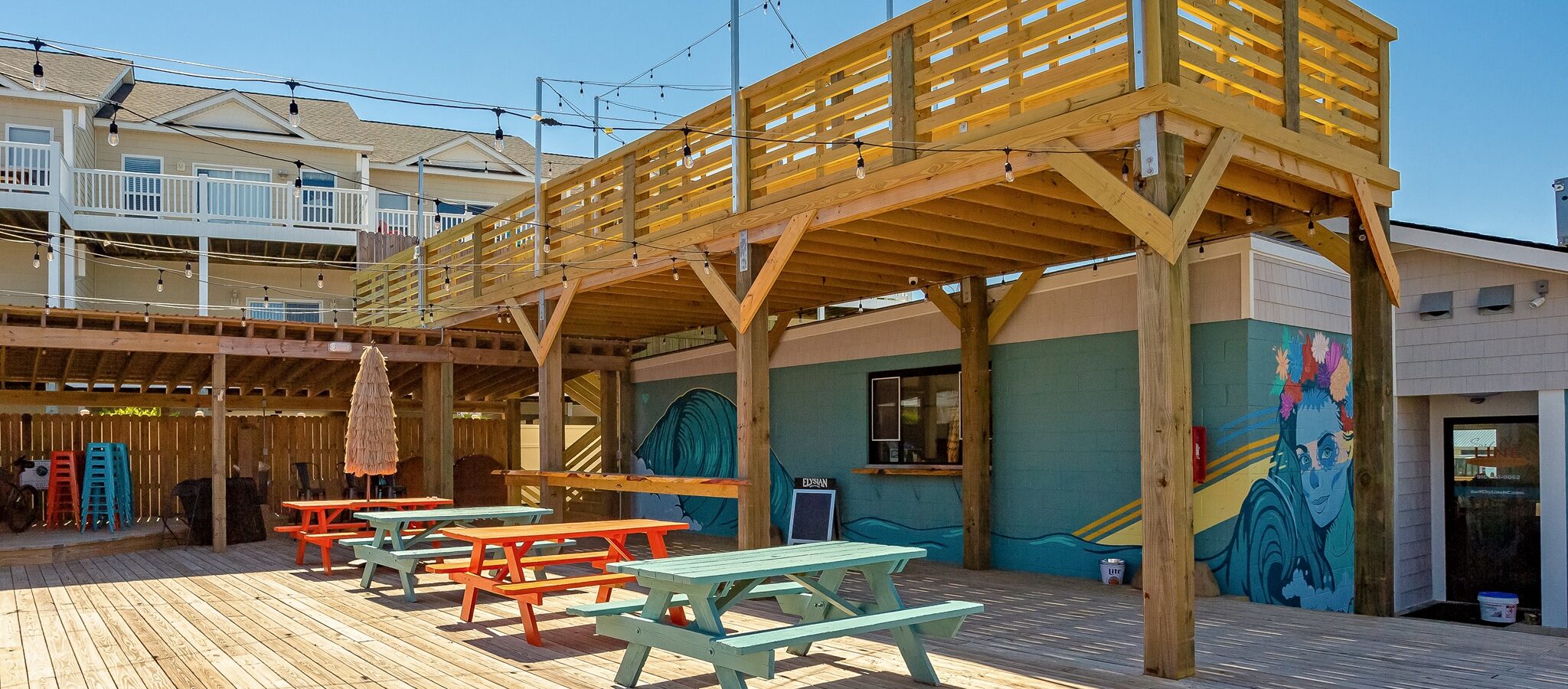 Lower level patio at Surf City Line